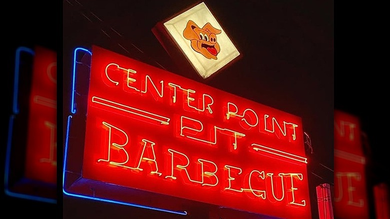 Neon sign of Center Point Barbecue restaurant at night
