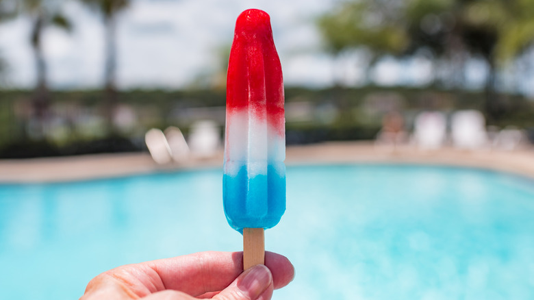 Hand holding up a Bomb Pop
