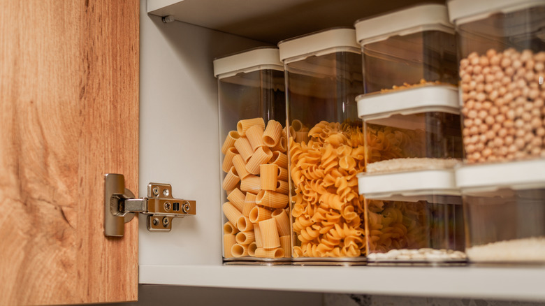Containers of dried foods in a pantry