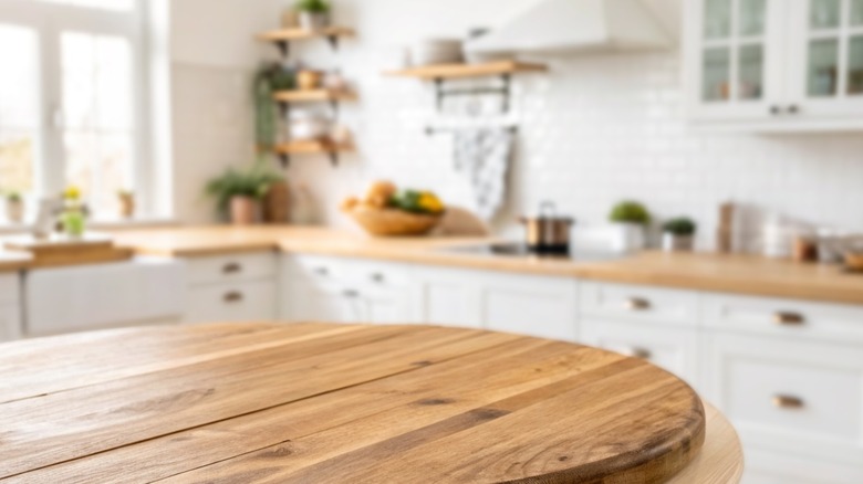 View of a tidy kitchen table and countertops.