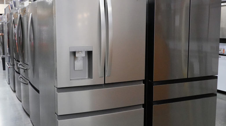 Rows of brand new fridges in a store