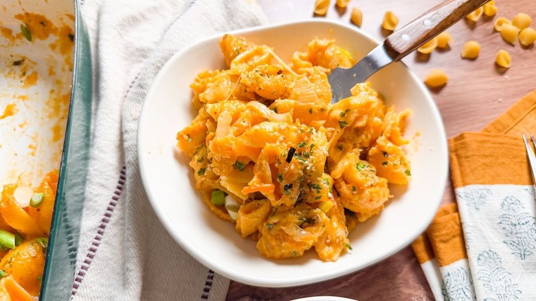 Kimchi mac and cheese in serving bowl with fork