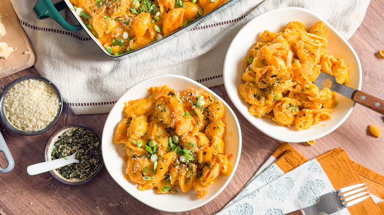 Kimchi mac and cheese in serving bowls with garnish