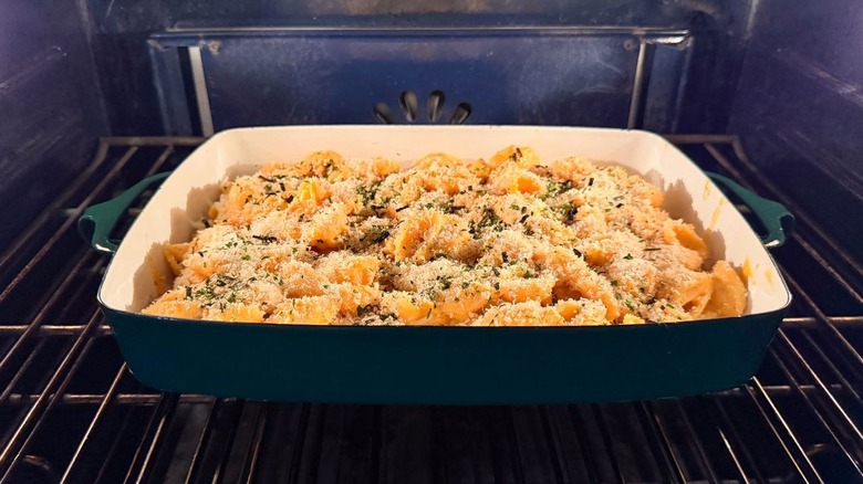 Kimchi mac and cheese baking in oven