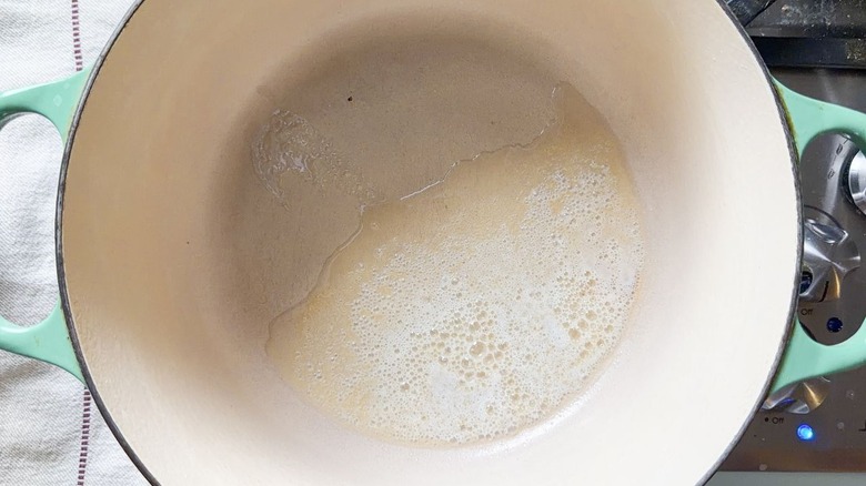 Butter melting in large pot on stovetop