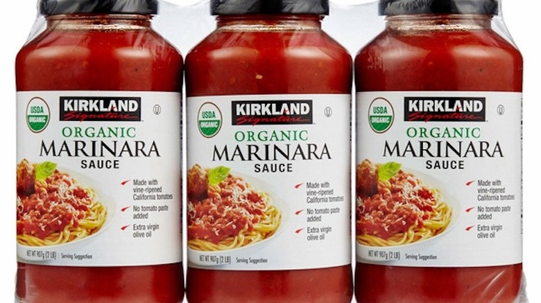 Stacked cases of Kirkland marinara sauce