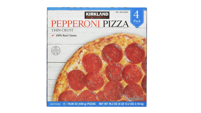 Box of Kirkland frozen pizzas