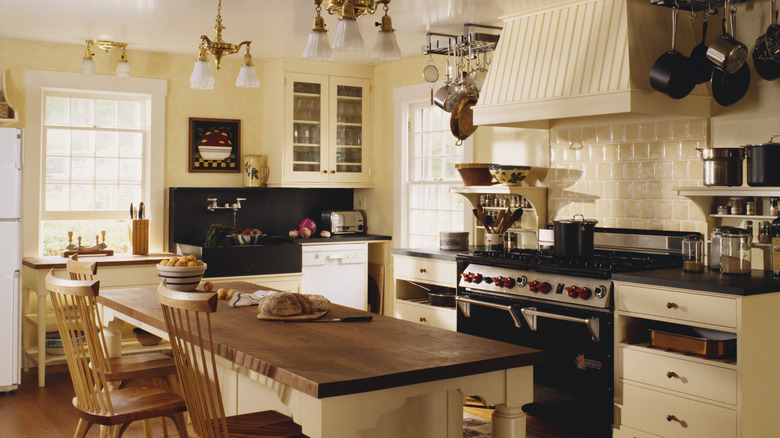 A vintage-style kitchen, complete with appliances and cookware, along with a spacious island