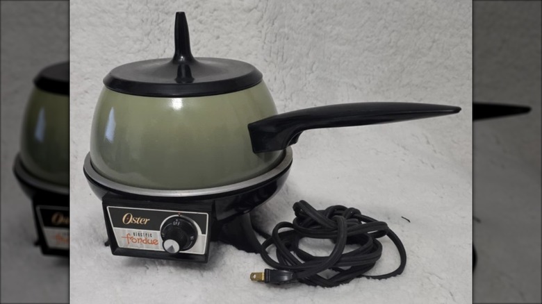 An Oster electric fondue set.