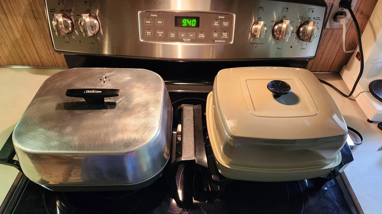 Electric frying pans on the stove.