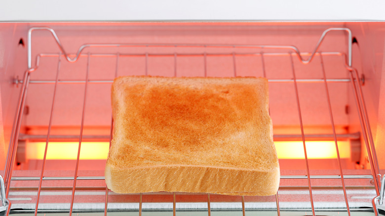 Toaster oven with a slice of toast
