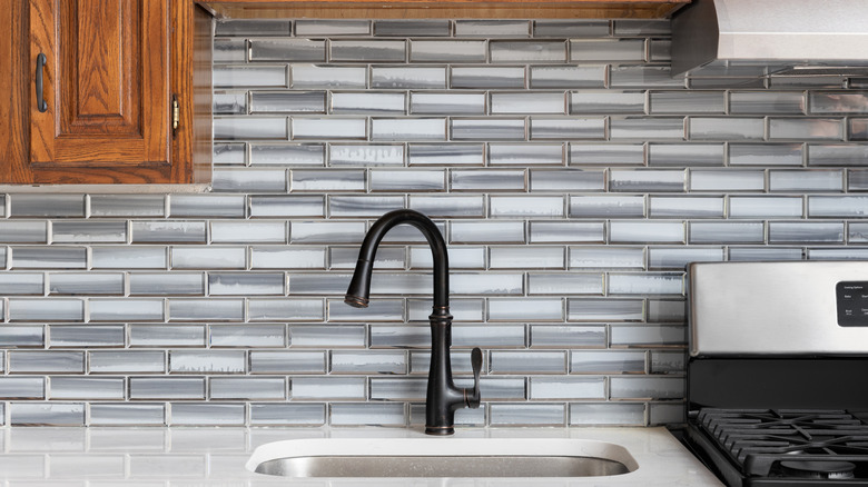 gray glass subway tile in modern kitchen