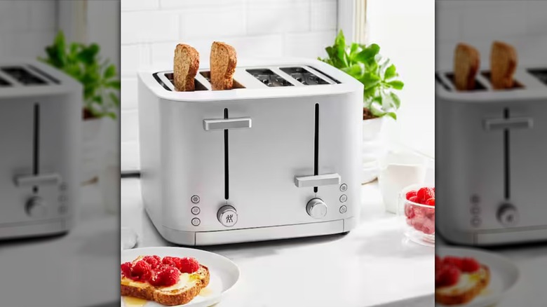 ZWILLING Enfinigy 4-Slot Toaster with two slices of toast in it on a countertop