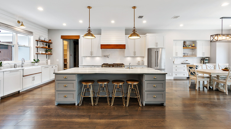 A large kitchen island in an open plan home