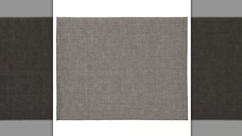 Ikea SVARTSENAP place mat in gray on a white background