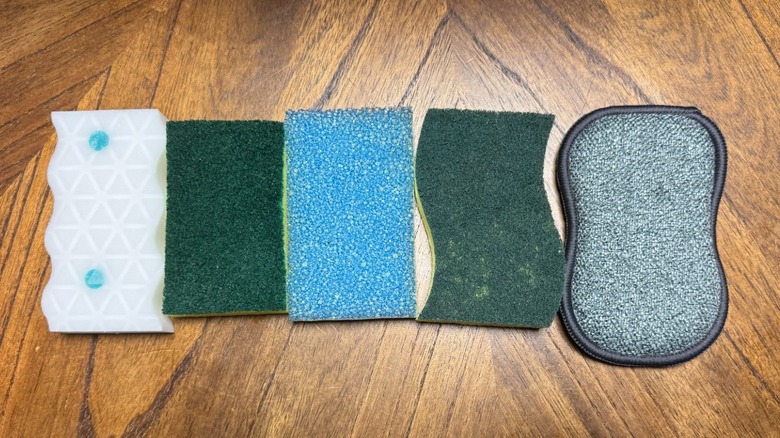 Five unwrapped sponges in a row