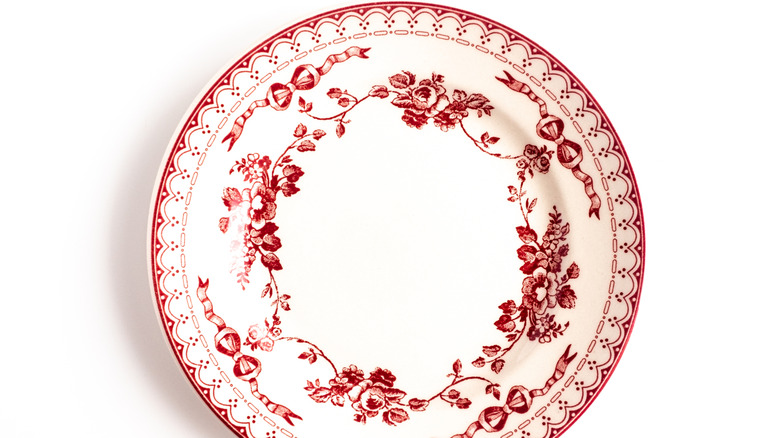 china serving dish with red patterns on white