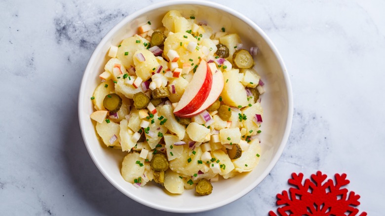 potato salad topped with apples