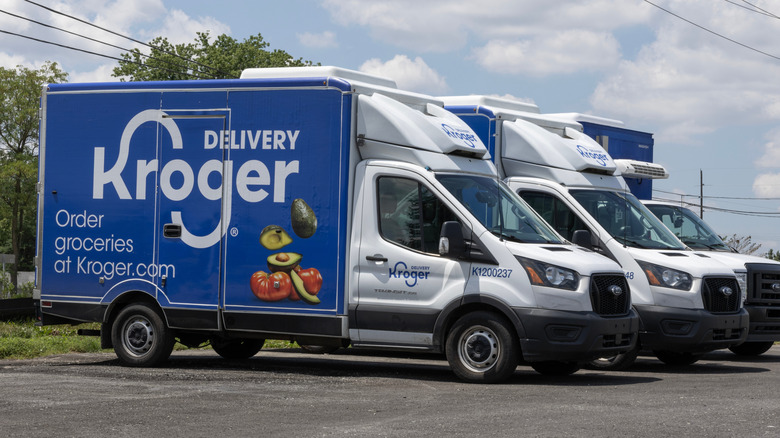 Kroger delivery vans in a parking lot