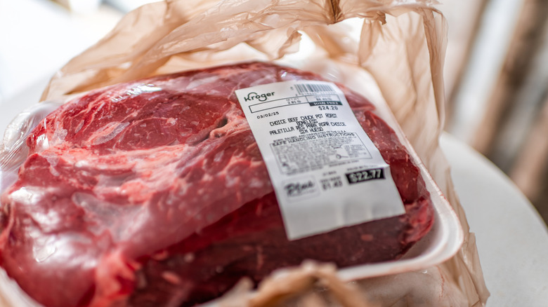 Beef chuck boneless pot roast inside a plastic wrap purchased from Kroger