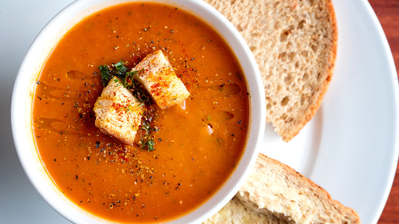 Tomato soup garnished with tomato paste croutons