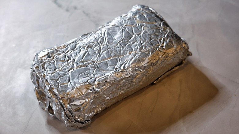 foil-wrapped block of shortbread dough