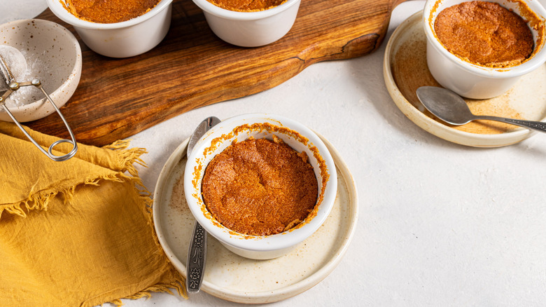 Ramekins with baked carrot souffle