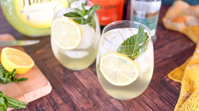 Limoncello Amalfi spritz drinks on counter with lemon and mint