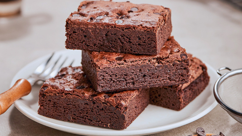 homemade chocolate brownies on a white plate