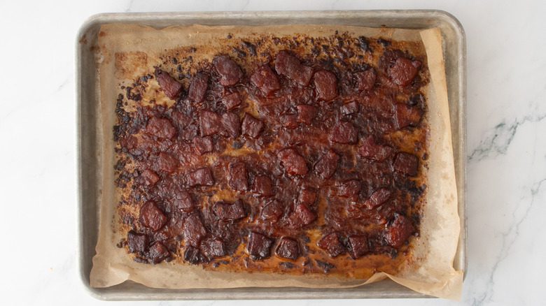 Crispy pork belly on a baking sheet