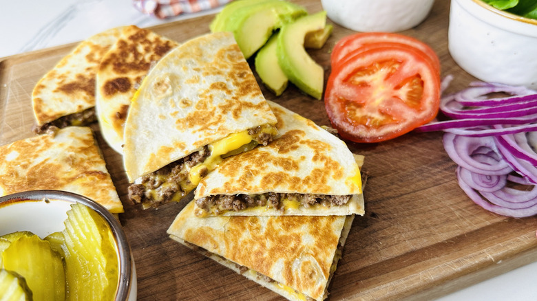 Loaded cheeseburger quesadilla on plate