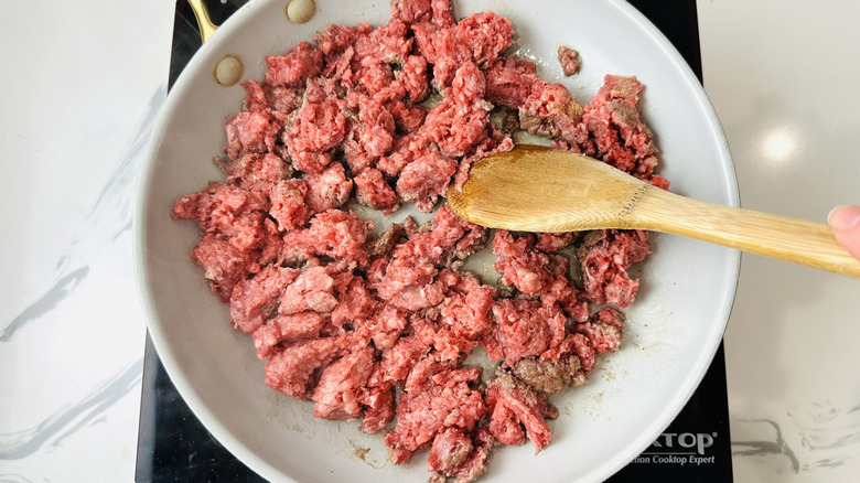 Cooking beef in skillet