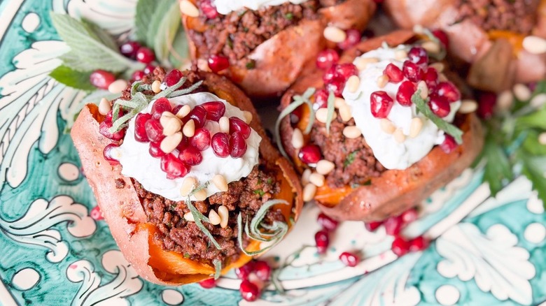 Loaded sweet potatoes with ras el hanout beef and lemon yogurt