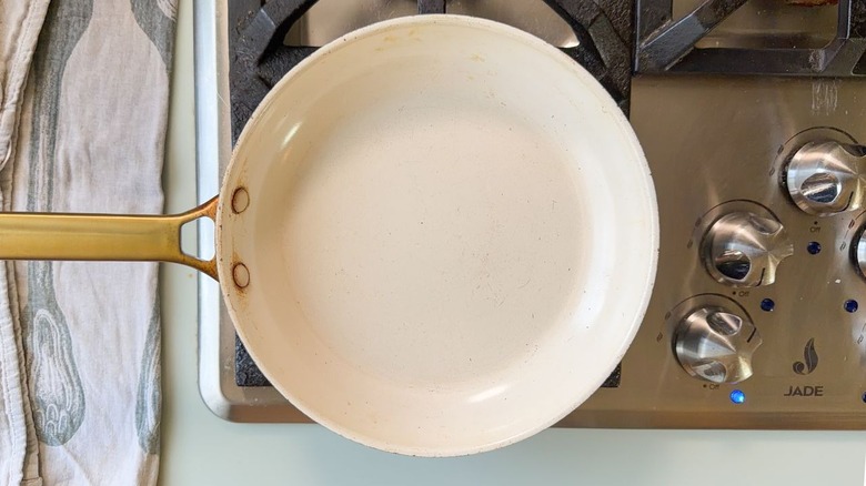 White skillet on stovetop