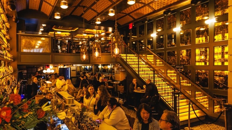 The bar at Valerie is awash in pretty, golden light.