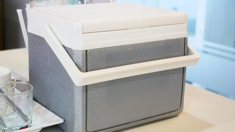 A grey cooler on a table