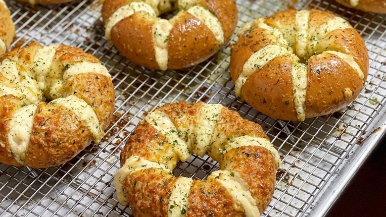 Calic Bagel's stuffed bagels on a wire rack