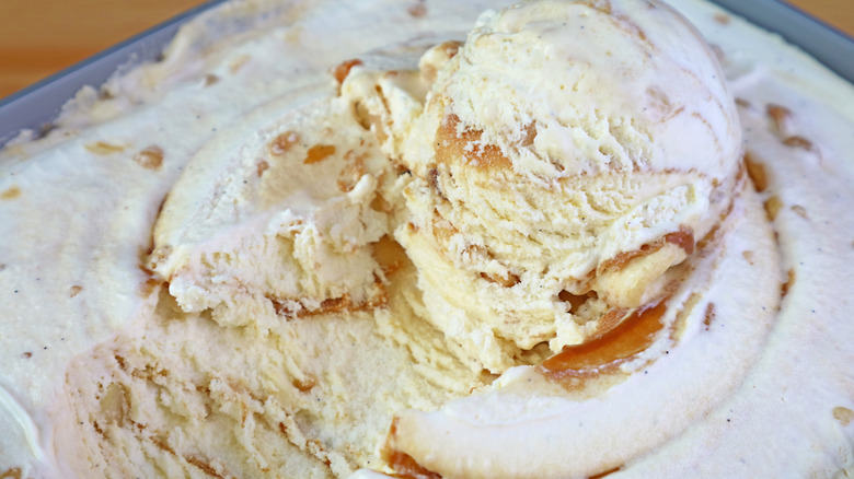 A close up of ice cream in a container