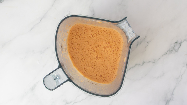 pinkish soup in a blender