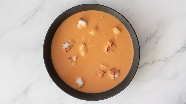 lobster bisque n a black bowl