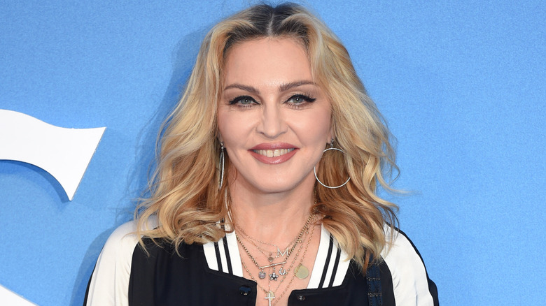 Madonna wearing a white suit at the 2025 Met Gala