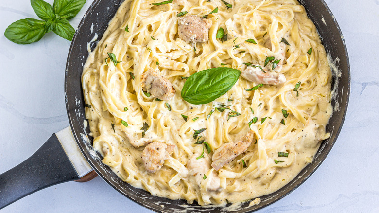 One Pot Chicken Alfredo Pasta in a Skillet Directly from Above Photo