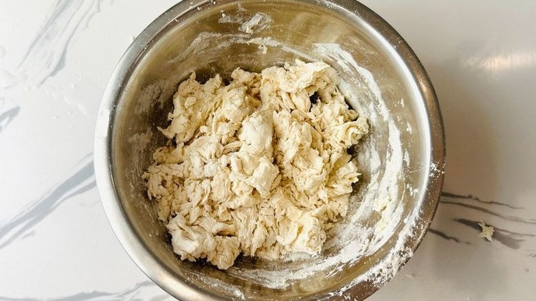 Shaggy pastry dough in bowl