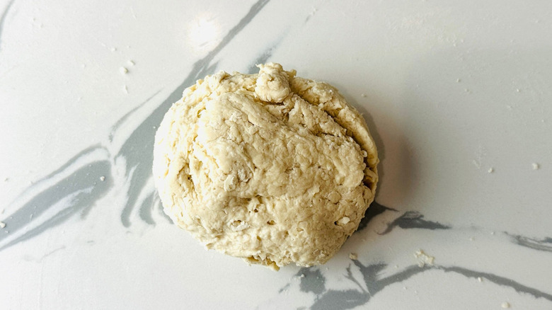 Pastry dough ball on countertop