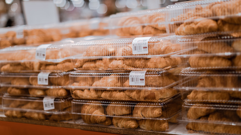 Clear plastic containers of Costco croissants