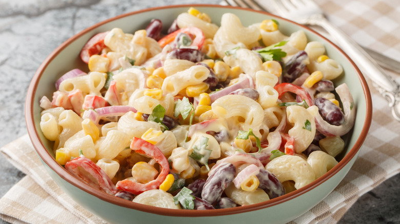 Homemade macaroni salad with elbow pasta and vegetables