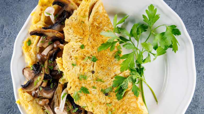 An omelet with mushrooms.