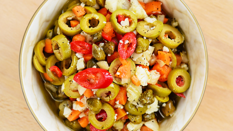 olive salad for mufuletta in a white bowl
