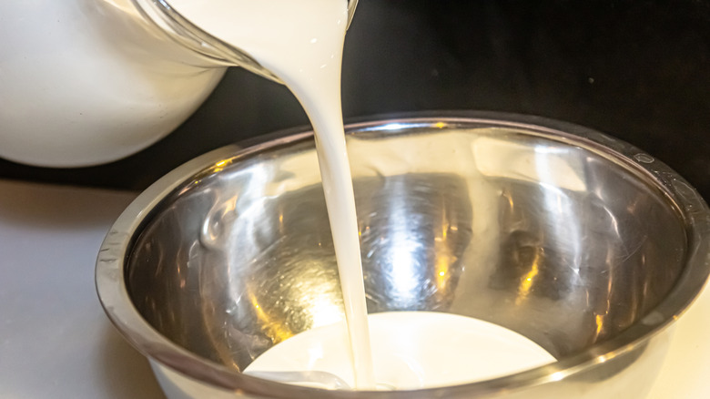 Heavy cream poured into a bowl