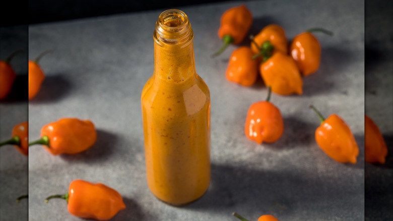 Bottle of sauce with habaneros.
